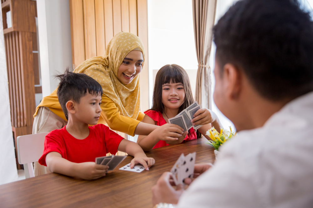 kids playing cards in classroom