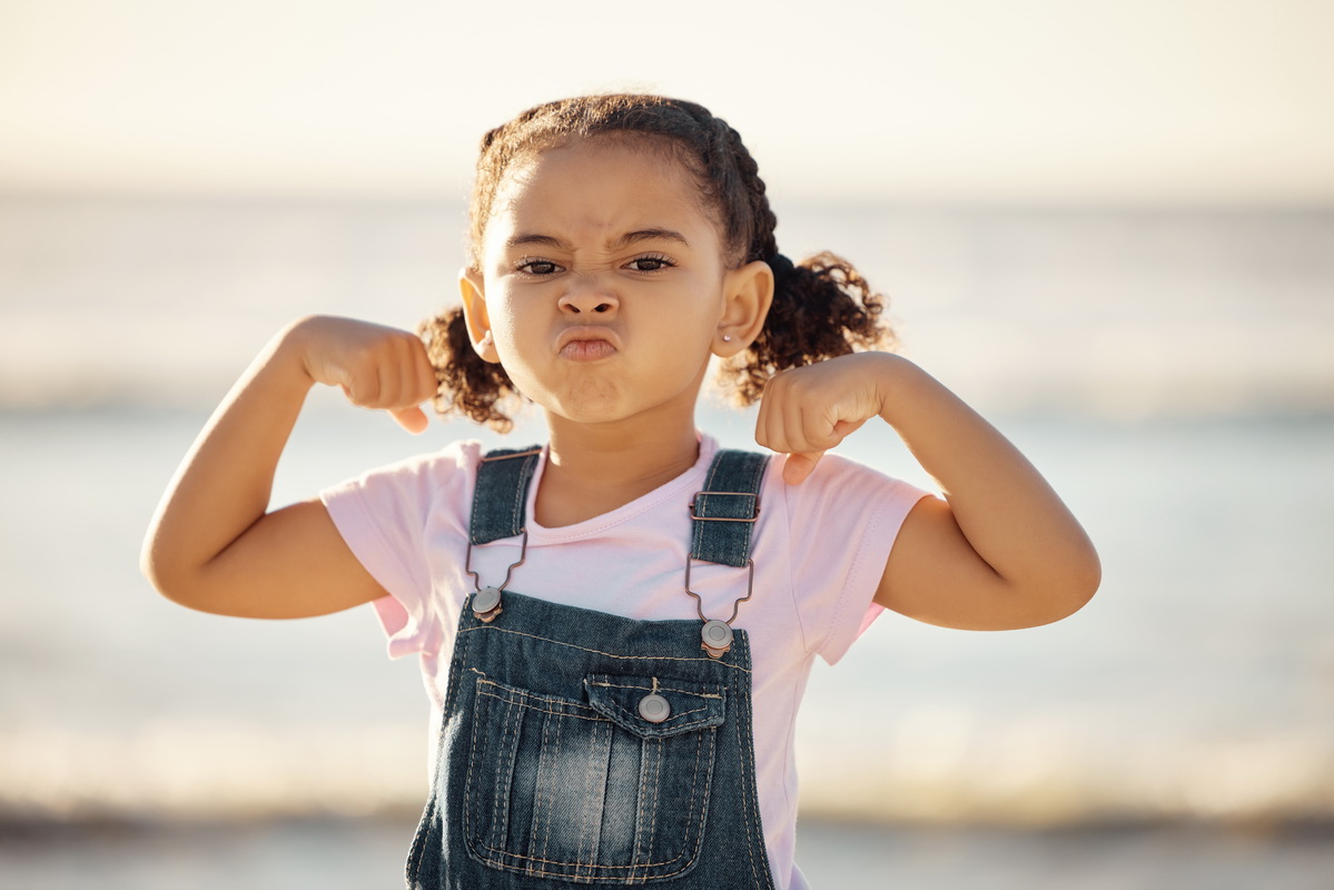 beach summer and a little girl pulling face and f 2026 01 09 10 20 46 utc