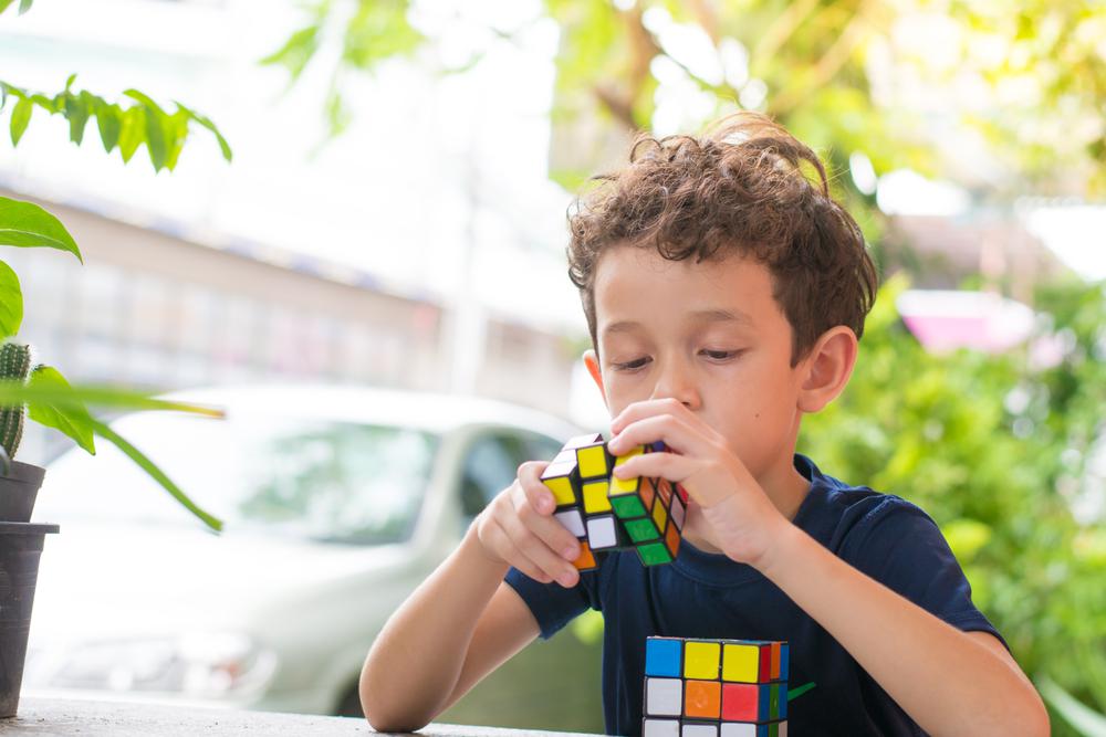 boy with a cubic rubic