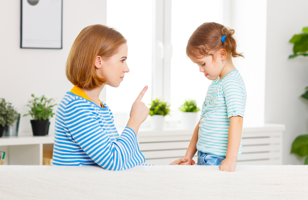 mom talking to her daughter