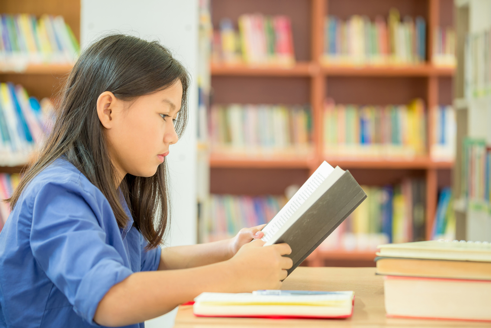 girl reading a book