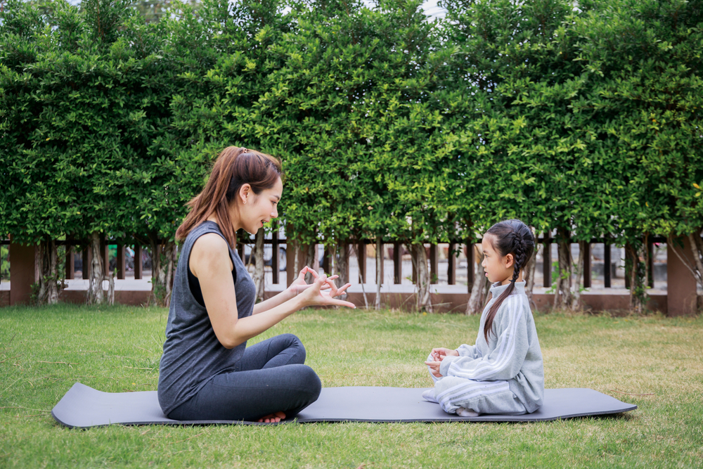 yoga training with a kid
