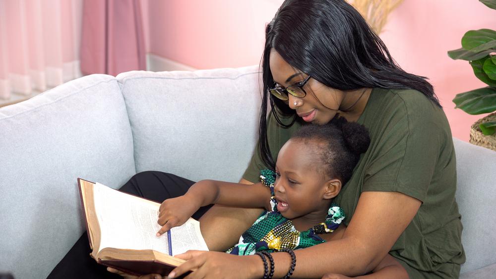 mom and daughter reading