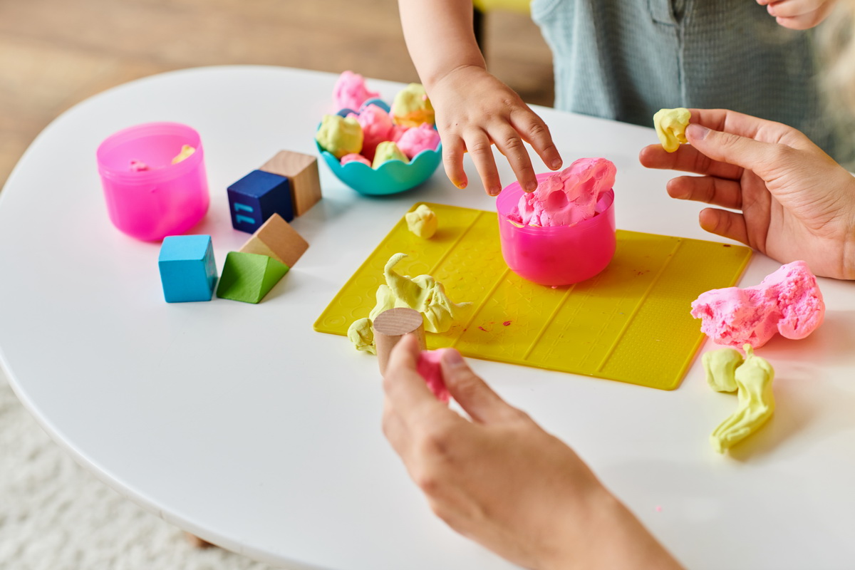 creative play child sculpting with play dough