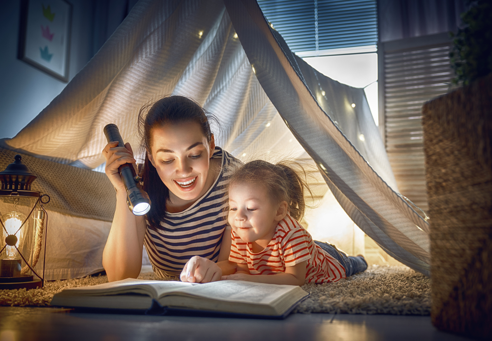 mom and kid reading a book