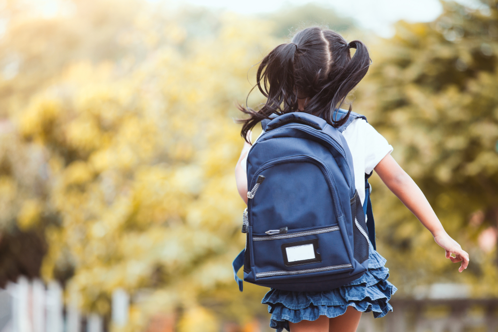 a girl with a backpack