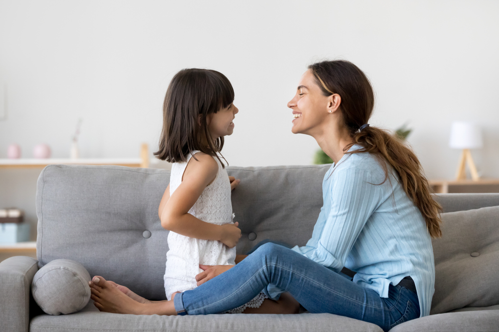 mom talking to her daughter