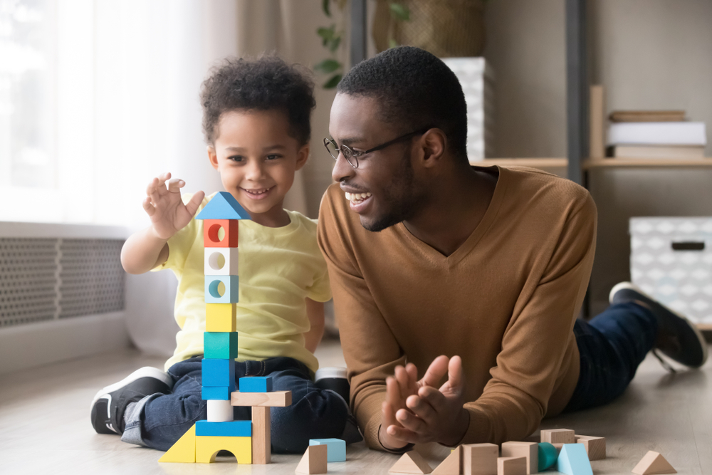 father playing with his kid