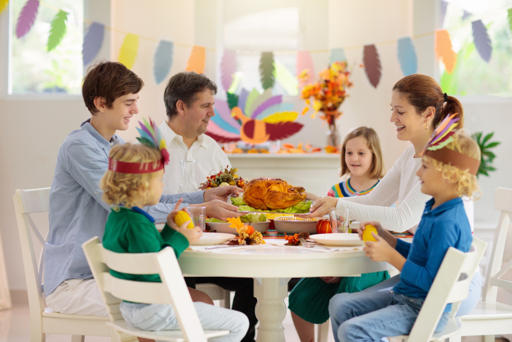 family dining together with turkey