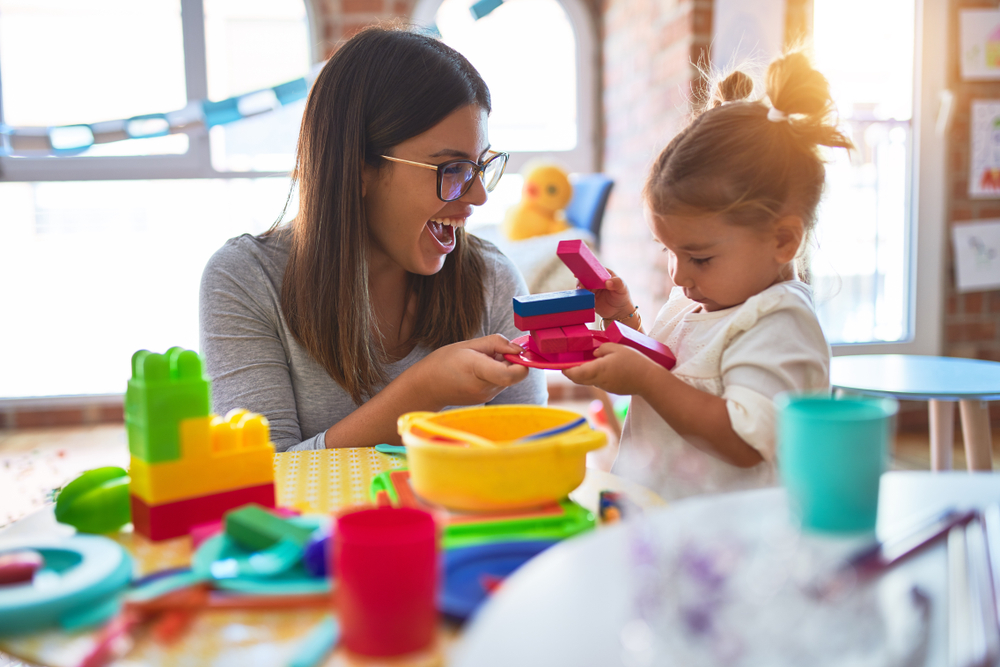 mom and daughter playing