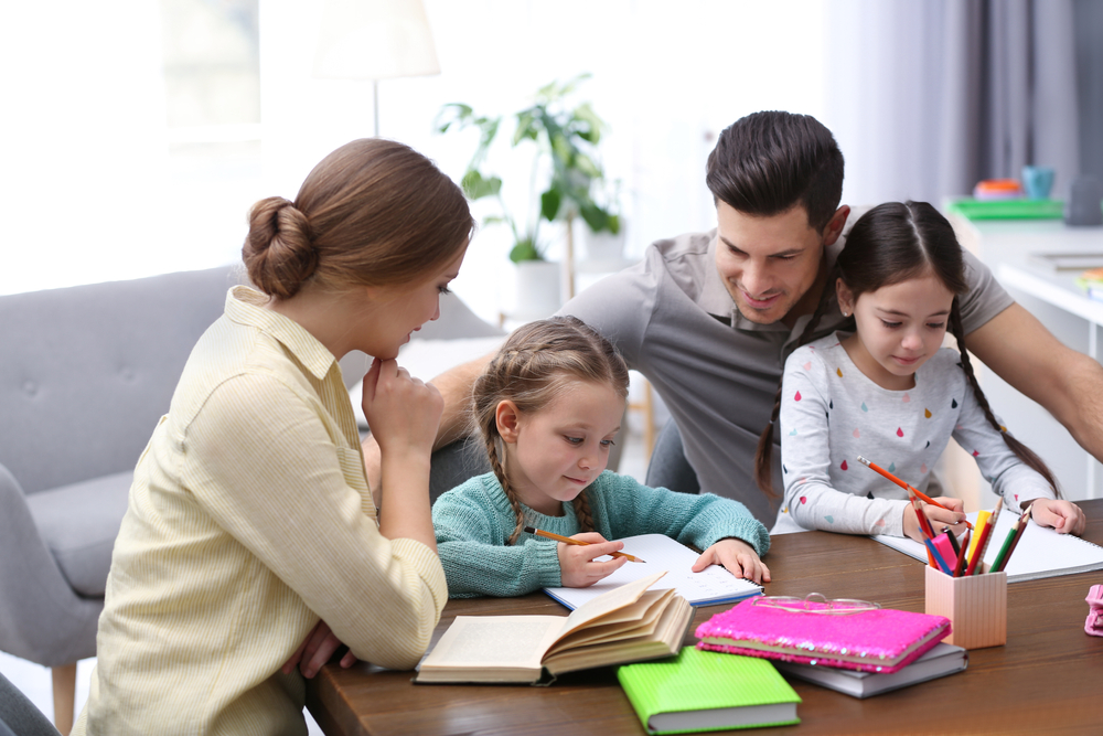 parents doing homework with children