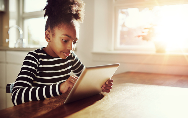 a girl studies at home