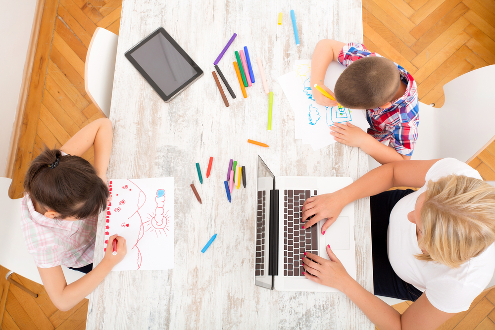 children are playing at the table