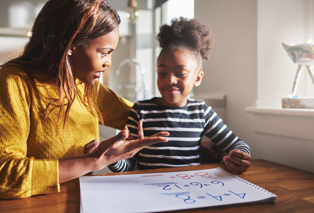 mom explaining math to her daughter