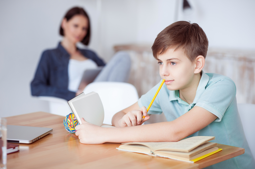 a boy doing his homework