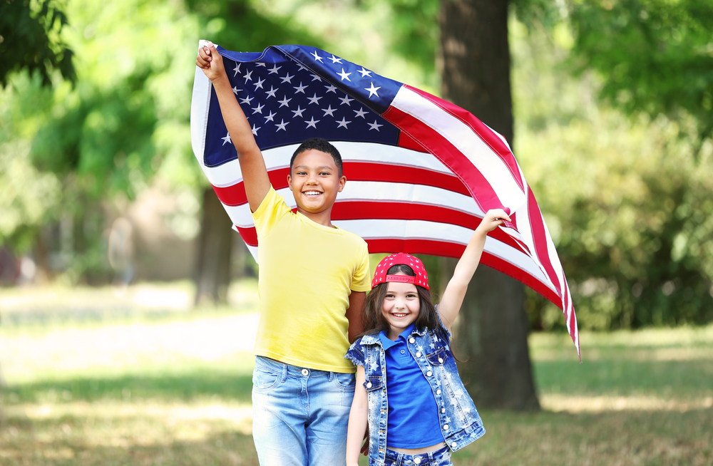 a boy with a flag