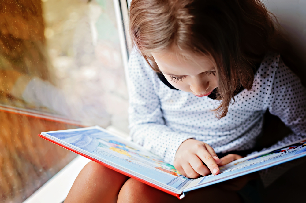 girl reading a book