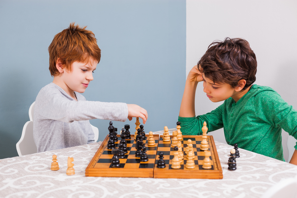 Kids playing chess