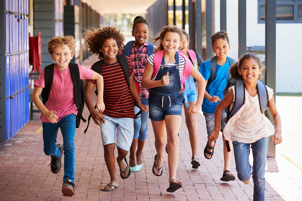 children walking in school