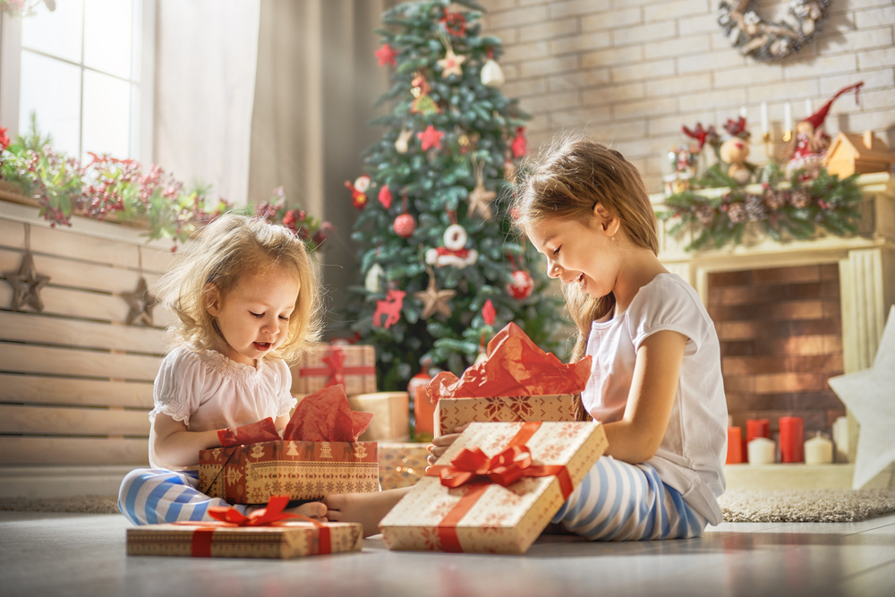 kids are playing with gifts