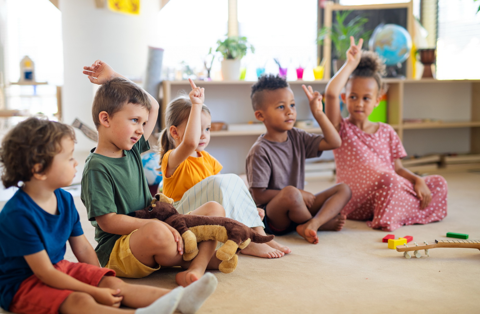 group of small nursery school children sitting on 2026 03 10 02 08 30 utc