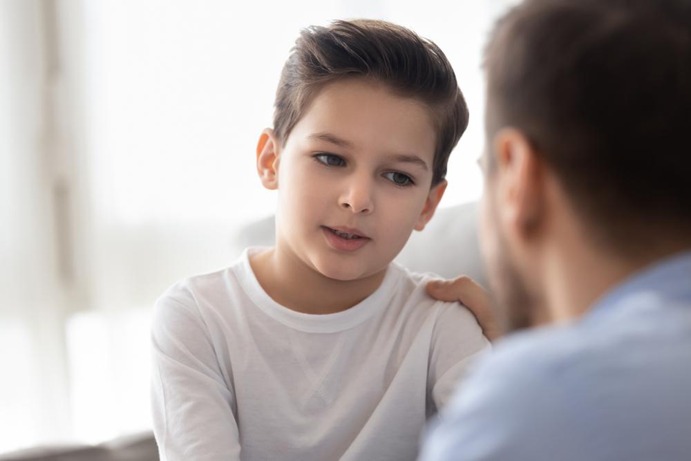 father discussing emotions with his son