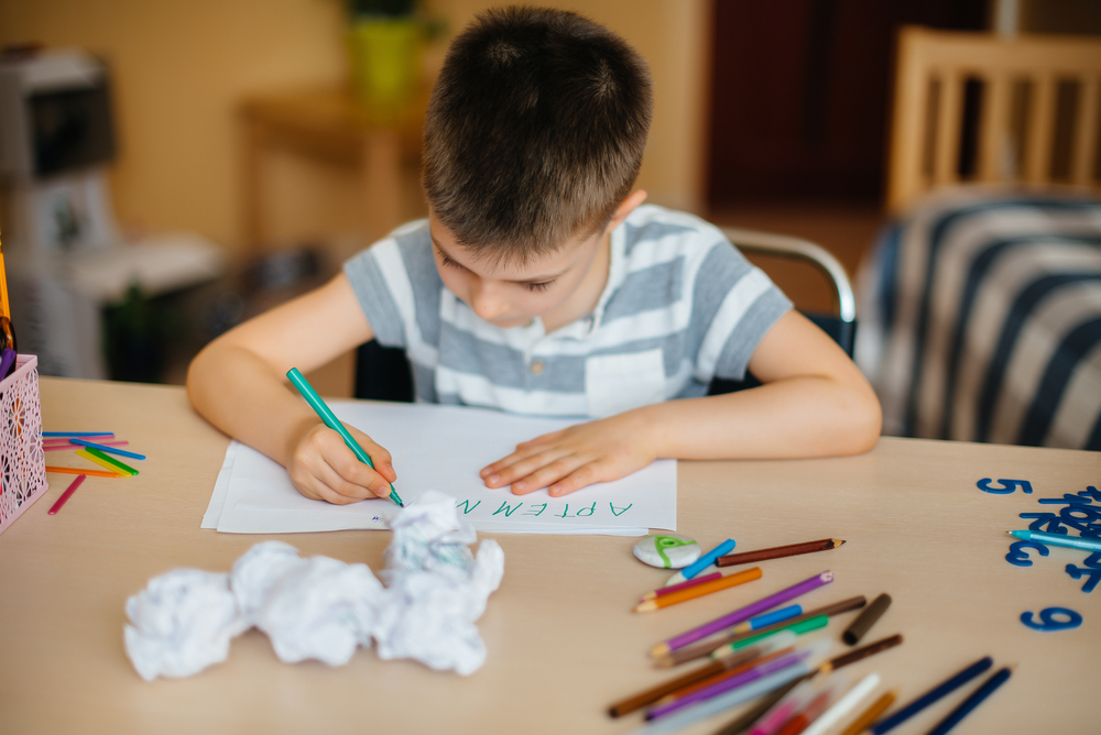 boy is writing