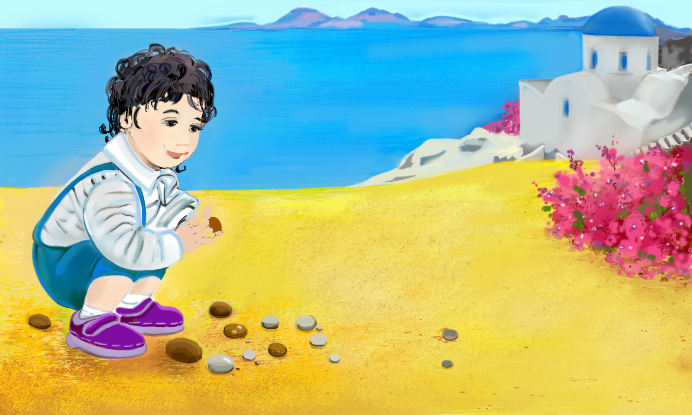 a boy sitting on sand