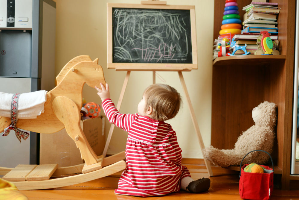 kid with toys